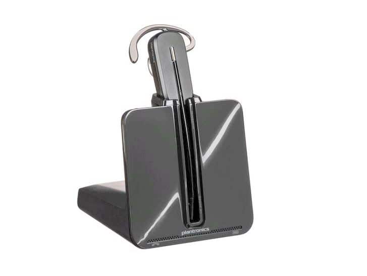 Plantronics CS540 Wireless Headset System on a desk with accessories