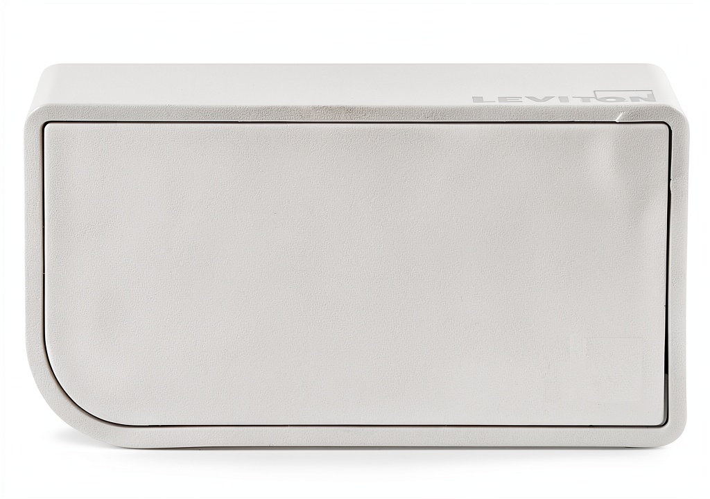 'Leviton Wi-Fi Bridge plugged into a wall outlet in a modern living room'